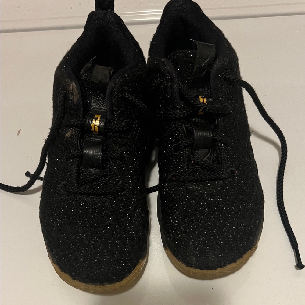 LeBron James Nike Kids Black and Gold Sneakers